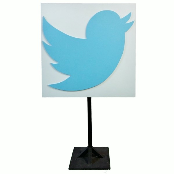 Twitter logo flat on stand